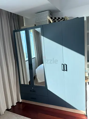 Blue 3-Door Wardrobe with Mirror and Drawers - Good Condition