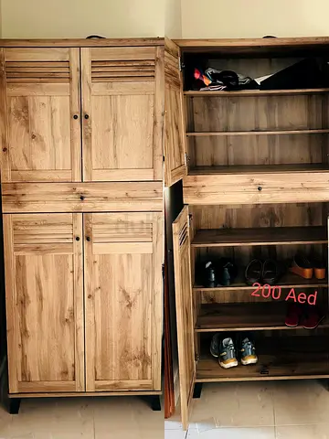 Solid wood sheo cabinet with 4 doors and a draw.good condition