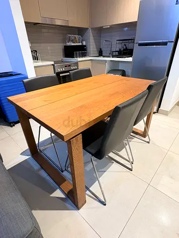 IKEA solid wood dining table with 4 chairs