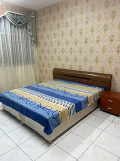 Fully furnished family room in Ajman with balcony