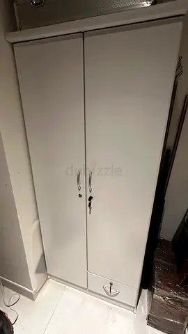 White two-door wardrobe with lock and drawer - good condition