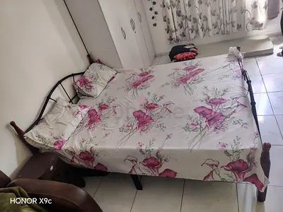 Metal frame Queen bed with wooden legs and mattress