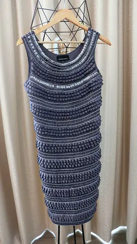 A dress by Frank Lyman Design, size 10