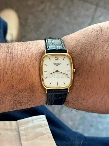 Classic Longines Gold-Tone Dress Watch with Black Leather Strap