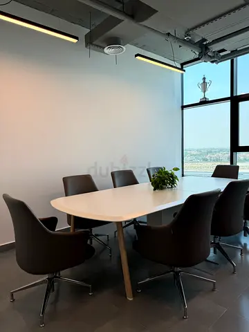 Modern White Conference Table with Gray Office Chairs