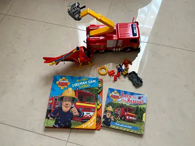 Fireman Sam large fire truck, Tom Thomas helicopter, accessories and story books — good condition