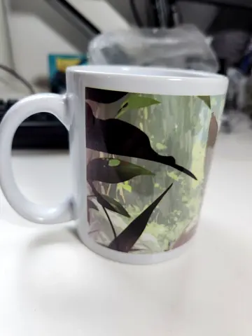 Coffee Mug with White Kitty in Green Leaf Design