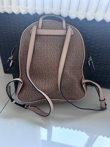 Guess Beige patterned small backpack - good condition