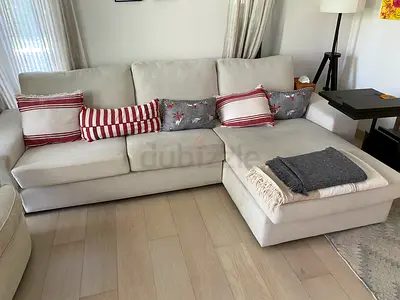 Light beige L-shaped sectional sofa with chaise, good condition