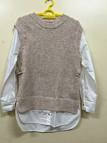 Beige knit sleeveless sweater vest over white blouse - 13-14 years girls