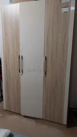 Two-door modern wardrobe in light wood and white finish