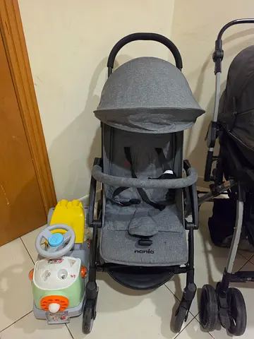 Lightweight grey baby stroller - almost new