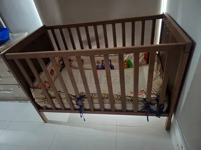 Solid Wood Baby Crib with unused Mattress and Bumpers - Good Condition