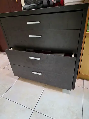 Dark wood 4-drawer chest / dresser - good for storage