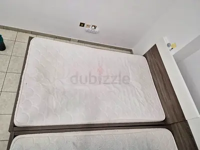 Two king size bed with drawer