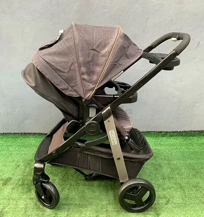 Used single stroller with reclining seat and large storage basket