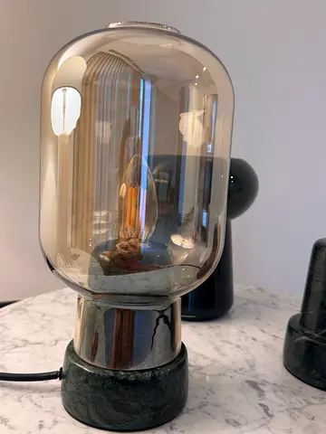 Vintage-style glass table lamp with exposed filament bulb