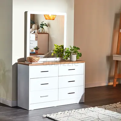 Modern white dresser with six drawers and large mirror