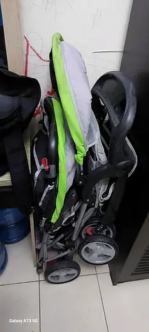 Compact Foldable Baby Stroller in Green and Grey