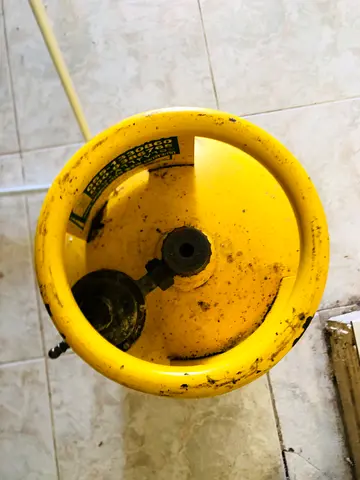 Stove and Small Yellow LPG Gas Cylinder - Used
