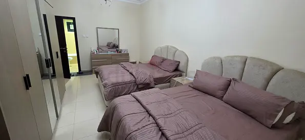 Pair of twin beds and mattresses with dressing table from Pan home — bedroom set.