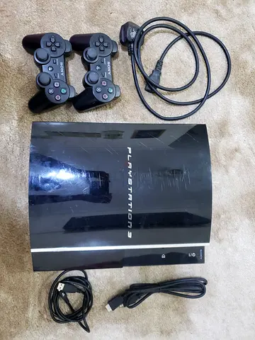 Sony PlayStation 3 Slim with 2 Controllers and Cables - Working Condition