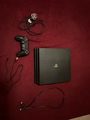 PlayStation 4 pro with DualShock 4 Controller and Cables - Good Working Condition