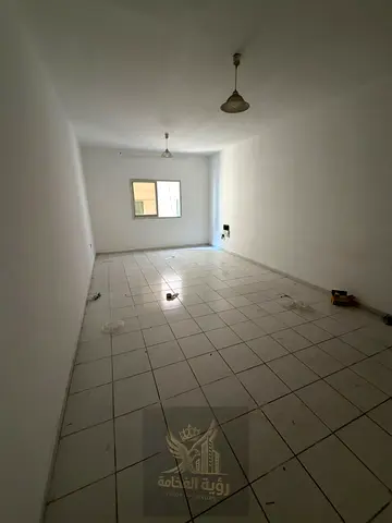 Spacious family studio in Al Taawun, Sharjah, with built-in wardrobes and easy access to Dubai exit.