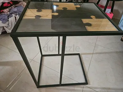 Modern black metal and glass side table with puzzle-pattern top
