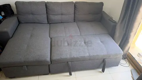 Dark Grey L-shaped Sofa bed with Storage Ottoman - Good Condition