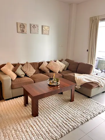 Comfortable L-shaped Fabric Sofa with Cushions and Throw