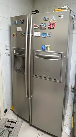 LG Side-by-Side Refrigerator with Water/Ice Dispenser - Good Condition