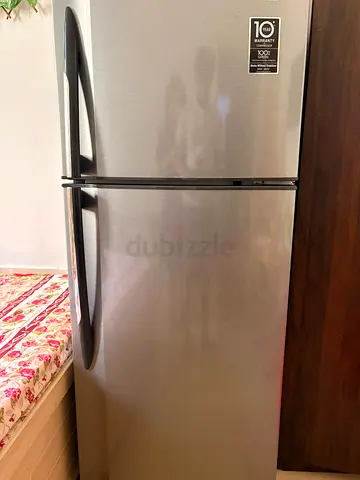 LG 2-Door Stainless Steel Fridge with Top Freezer - Good Condition