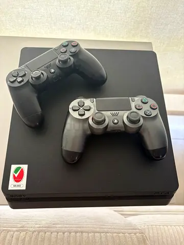 PS4 with two original controllers