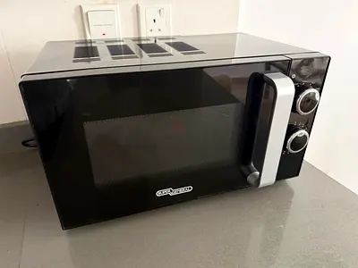 Compact Black Countertop Microwave Oven - Good Working Condition