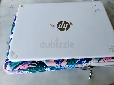 White HP 14 Laptop (lightly used) with floral sleeve