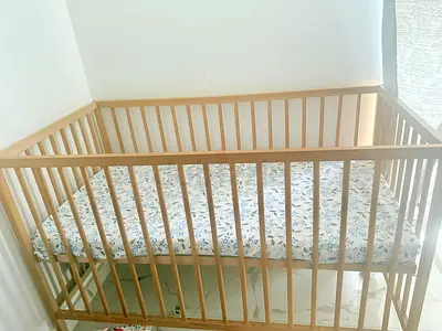Solid Wood Baby Crib in Natural Finish - Good Condition