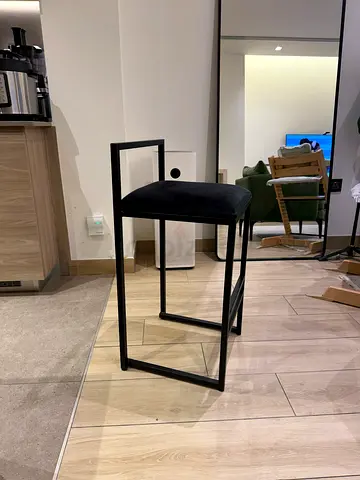4 black steel barstools