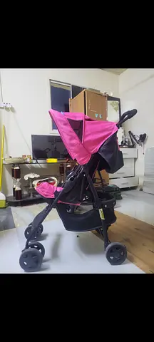 Pink Used Baby Stroller – Good Condition – 90 AED