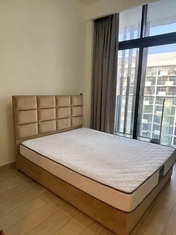 Queen upholstered bed frame with mattress - light tan, good condition