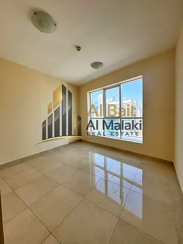 A featured apartment with two master bedrooms and a living room with an open view and free parking