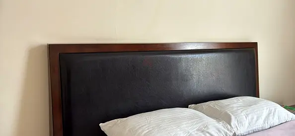 Wooden Bed Headboard with Padded Leatherette Center,