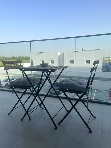 Balcony table with two chairs