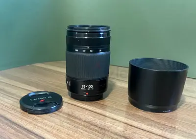Panasonic Lumix G Vario 35-100mm f/4-5.6 Micro Four Thirds Lens with Hood and Cap