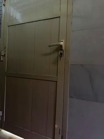 Metal door with lock in good used condition