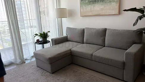 Light grey L-shaped 3-seater sofa with chaise — good condition