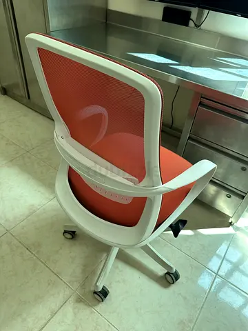 Ergonomic Orange Mesh Office Chair with Wheels - Good Condition
