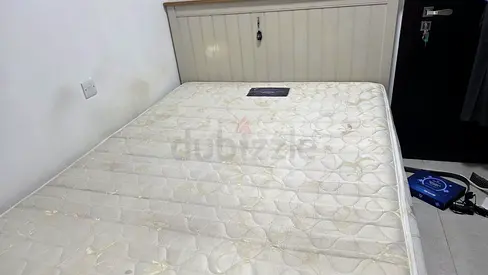 Single storage bed frame with mattress — good condition