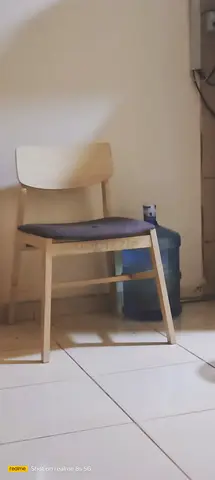Simple wooden dining/desk chair with cushion