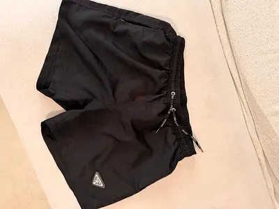 Black Prada swim shorts - size medium, good condition
